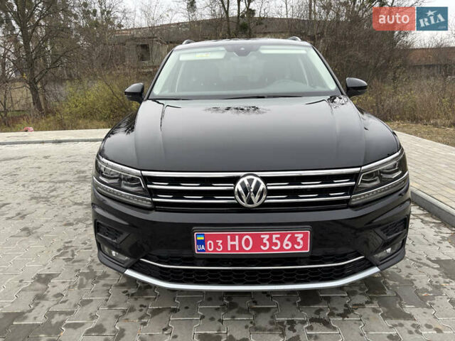 Черный Фольксваген Тигуан, объемом двигателя 2 л и пробегом 227 тыс. км за 24100 $, фото 4 на Automoto.ua