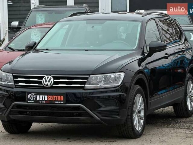 Чорний Фольксваген Тігуан, об'ємом двигуна 2 л та пробігом 129 тис. км за 17500 $, фото 2 на Automoto.ua