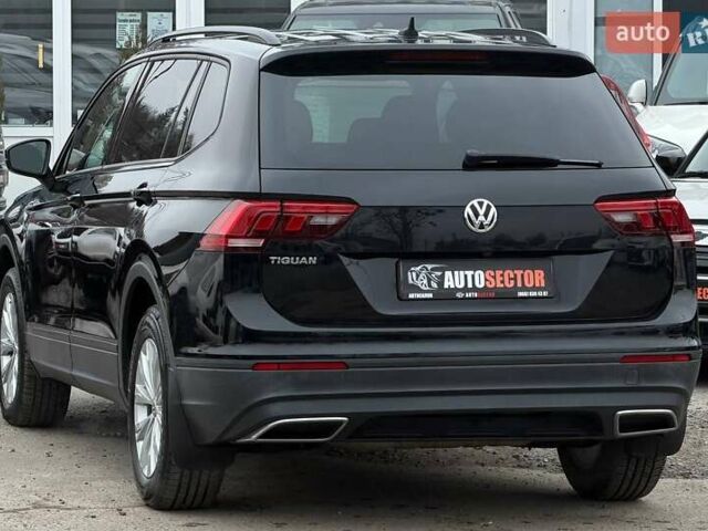 Чорний Фольксваген Тігуан, об'ємом двигуна 2 л та пробігом 129 тис. км за 17500 $, фото 6 на Automoto.ua