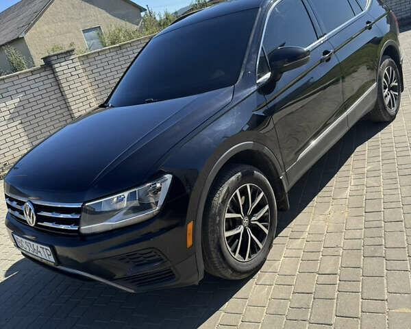 Чорний Фольксваген Тігуан, об'ємом двигуна 1.98 л та пробігом 130 тис. км за 21500 $, фото 1 на Automoto.ua