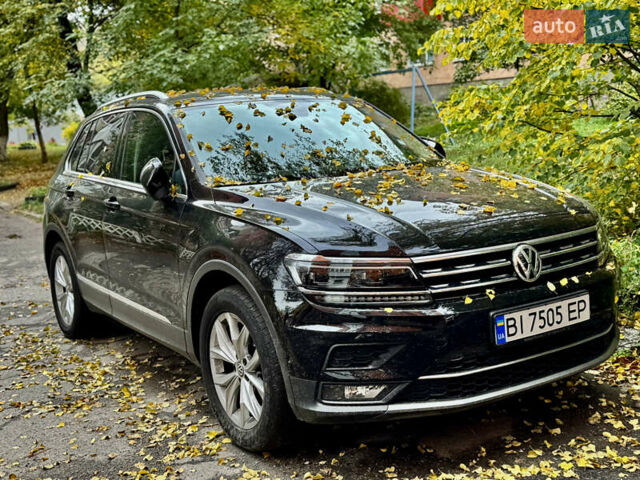 Чорний Фольксваген Тігуан, об'ємом двигуна 1.97 л та пробігом 70 тис. км за 31500 $, фото 1 на Automoto.ua
