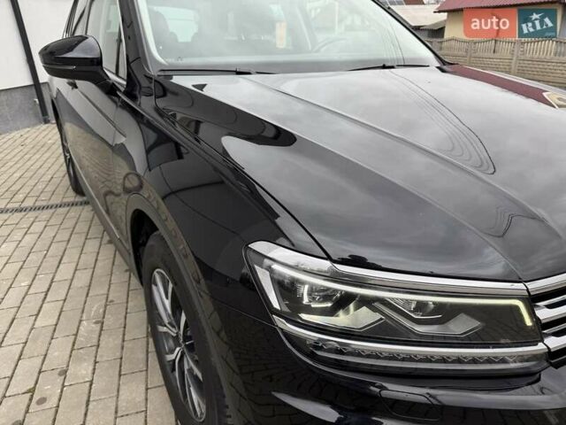 Чорний Фольксваген Тігуан, об'ємом двигуна 2 л та пробігом 228 тис. км за 26900 $, фото 21 на Automoto.ua