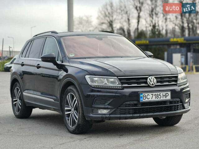 Черный Фольксваген Тигуан, объемом двигателя 1.97 л и пробегом 208 тыс. км за 25300 $, фото 2 на Automoto.ua