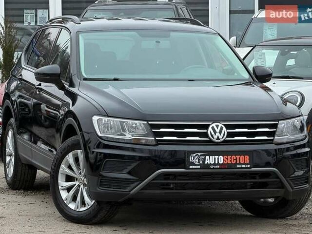 Чорний Фольксваген Тігуан, об'ємом двигуна 2 л та пробігом 129 тис. км за 17500 $, фото 5 на Automoto.ua