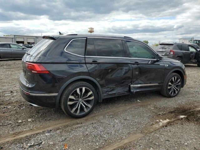 Черный Фольксваген Тигуан, объемом двигателя 2 л и пробегом 28 тыс. км за 5000 $, фото 2 на Automoto.ua