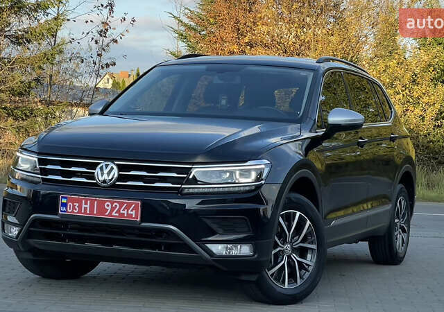Черный Фольксваген Тигуан, объемом двигателя 2 л и пробегом 170 тыс. км за 18799 $, фото 4 на Automoto.ua