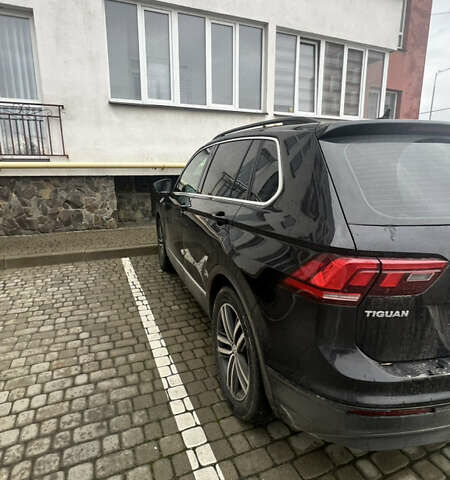 Черный Фольксваген Тигуан, объемом двигателя 1.97 л и пробегом 208 тыс. км за 27500 $, фото 2 на Automoto.ua