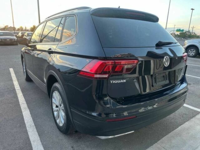 Черный Фольксваген Тигуан, объемом двигателя 2 л и пробегом 39 тыс. км за 8900 $, фото 4 на Automoto.ua