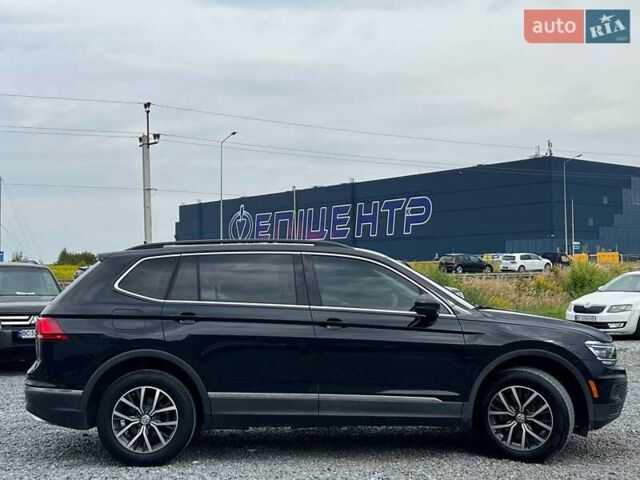 Черный Фольксваген Тигуан, объемом двигателя 2 л и пробегом 168 тыс. км за 17440 $, фото 3 на Automoto.ua