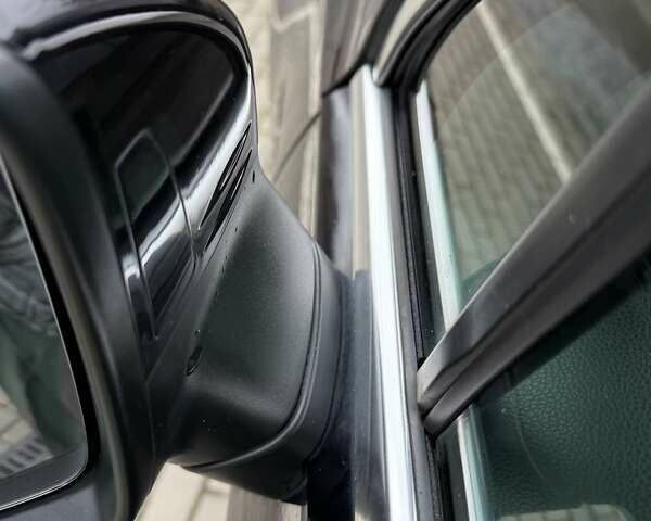 Чорний Фольксваген Тігуан, об'ємом двигуна 2 л та пробігом 228 тис. км за 26900 $, фото 4 на Automoto.ua