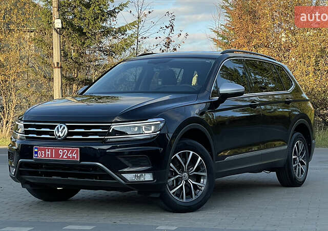 Черный Фольксваген Тигуан, объемом двигателя 2 л и пробегом 170 тыс. км за 18799 $, фото 3 на Automoto.ua