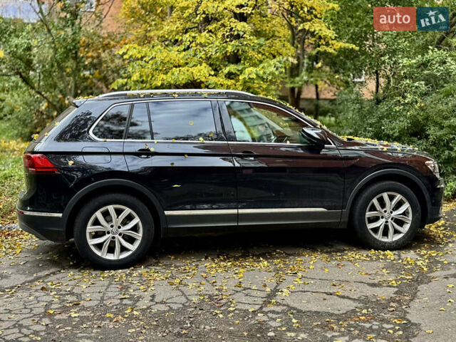 Чорний Фольксваген Тігуан, об'ємом двигуна 1.97 л та пробігом 70 тис. км за 31500 $, фото 2 на Automoto.ua