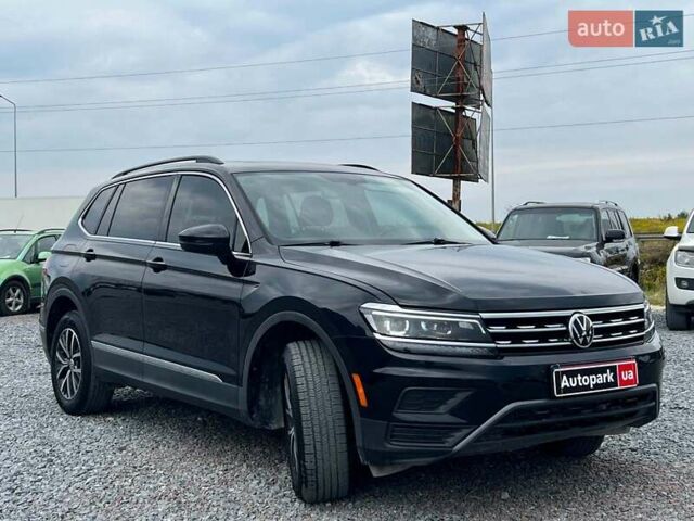 Черный Фольксваген Тигуан, объемом двигателя 2 л и пробегом 168 тыс. км за 17440 $, фото 2 на Automoto.ua