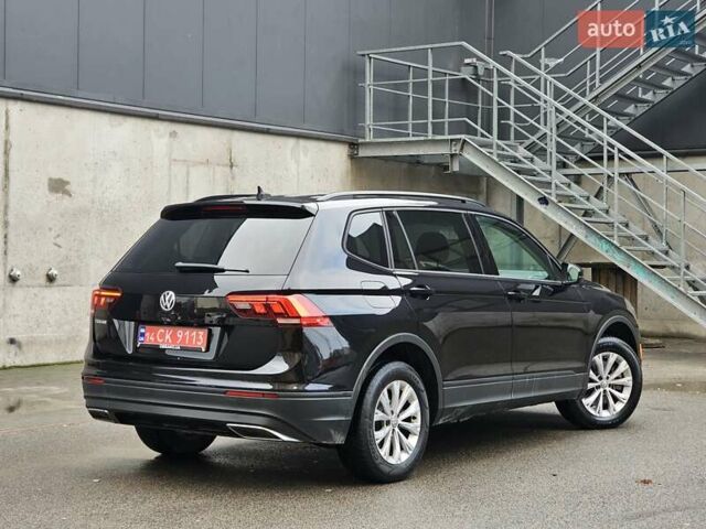 Черный Фольксваген Тигуан, объемом двигателя 2 л и пробегом 106 тыс. км за 18999 $, фото 4 на Automoto.ua
