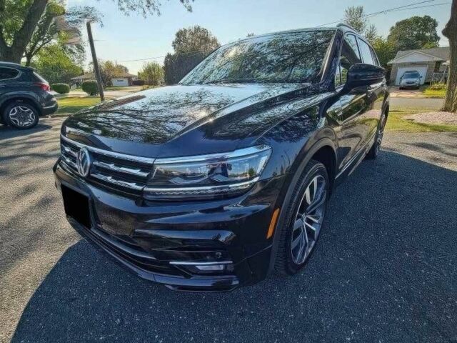 Черный Фольксваген Тигуан, объемом двигателя 2 л и пробегом 45 тыс. км за 11000 $, фото 2 на Automoto.ua