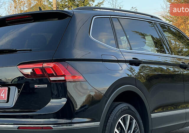 Черный Фольксваген Тигуан, объемом двигателя 2 л и пробегом 170 тыс. км за 18799 $, фото 32 на Automoto.ua