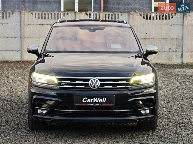 Черный Фольксваген Тигуан, объемом двигателя 2 л и пробегом 177 тыс. км за 32999 $, фото 1 на Automoto.ua