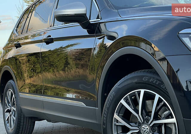 Черный Фольксваген Тигуан, объемом двигателя 2 л и пробегом 170 тыс. км за 18799 $, фото 22 на Automoto.ua