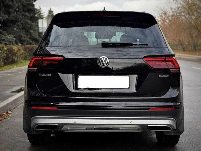 Чорний Фольксваген Тігуан, об'ємом двигуна 2 л та пробігом 134 тис. км за 22000 $, фото 3 на Automoto.ua