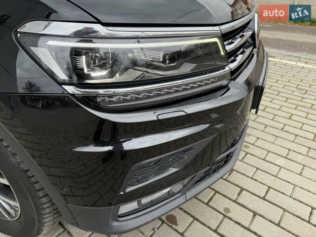 Чорний Фольксваген Тігуан, об'ємом двигуна 2 л та пробігом 228 тис. км за 26900 $, фото 19 на Automoto.ua