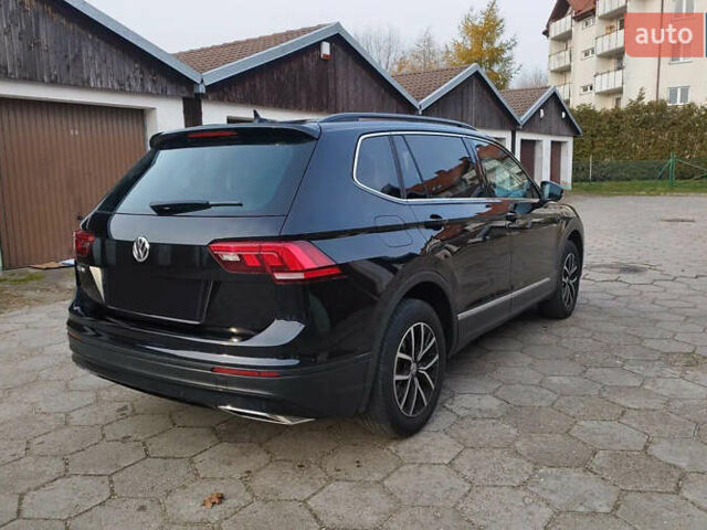 Черный Фольксваген Тигуан, объемом двигателя 2 л и пробегом 96 тыс. км за 16300 $, фото 1 на Automoto.ua