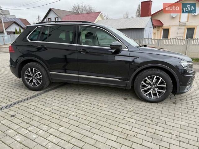 Чорний Фольксваген Тігуан, об'ємом двигуна 2 л та пробігом 228 тис. км за 26900 $, фото 18 на Automoto.ua