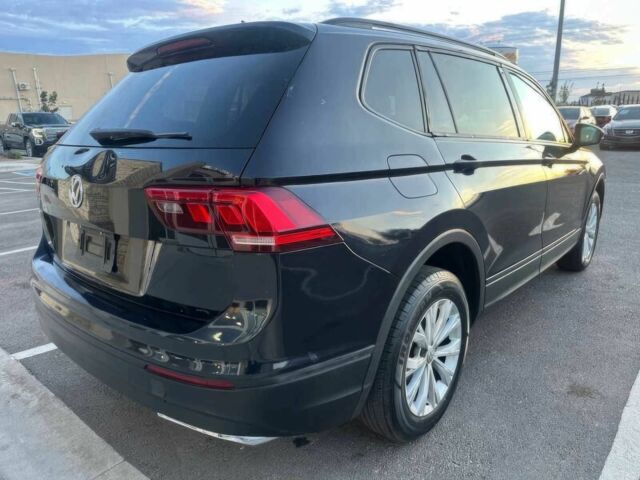 Чорний Фольксваген Тігуан, об'ємом двигуна 2 л та пробігом 44 тис. км за 15500 $, фото 5 на Automoto.ua