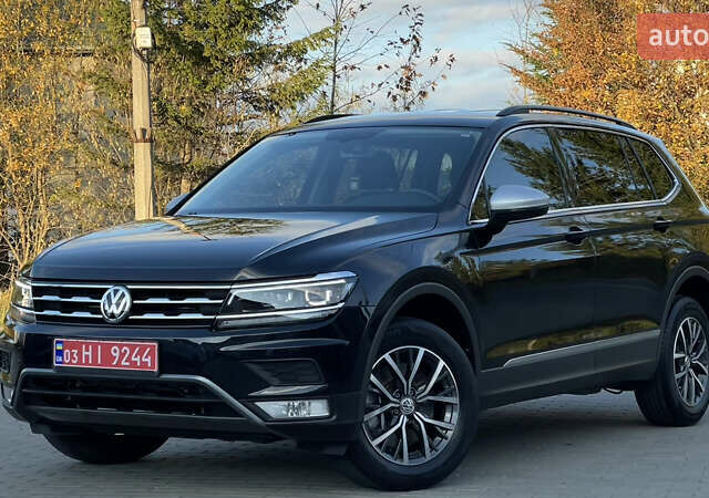 Черный Фольксваген Тигуан, объемом двигателя 2 л и пробегом 170 тыс. км за 18799 $, фото 2 на Automoto.ua