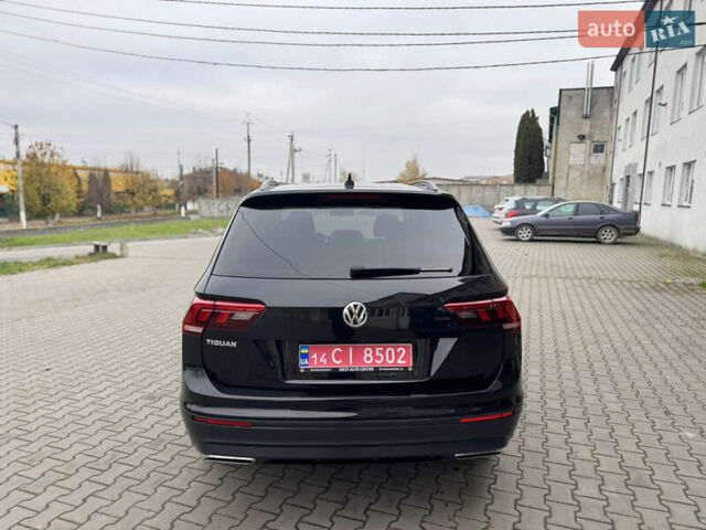 Чорний Фольксваген Тігуан, об'ємом двигуна 2 л та пробігом 232 тис. км за 14200 $, фото 14 на Automoto.ua