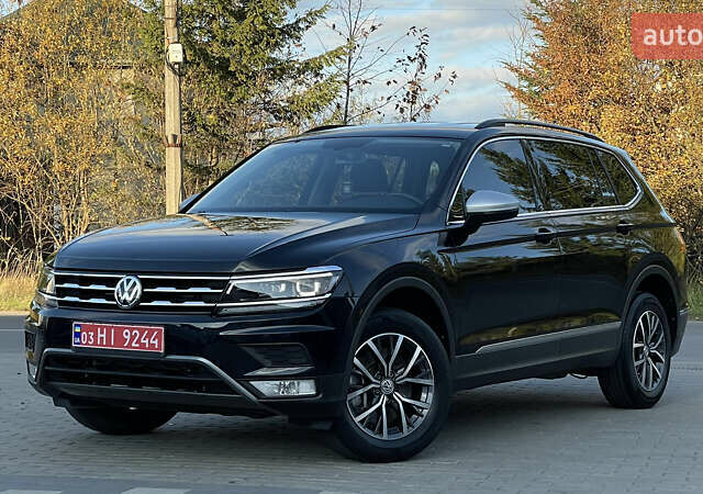 Черный Фольксваген Тигуан, объемом двигателя 2 л и пробегом 170 тыс. км за 18799 $, фото 1 на Automoto.ua