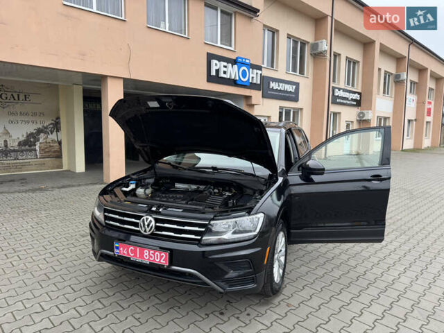 Чорний Фольксваген Тігуан, об'ємом двигуна 2 л та пробігом 232 тис. км за 14200 $, фото 40 на Automoto.ua