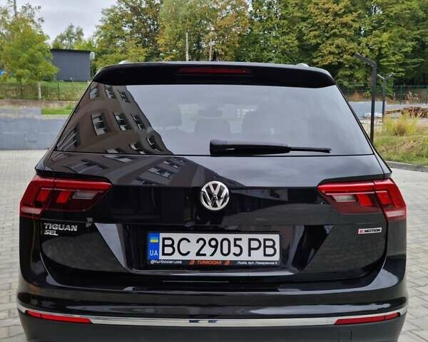 Черный Фольксваген Тигуан, объемом двигателя 2 л и пробегом 58 тыс. км за 26900 $, фото 5 на Automoto.ua