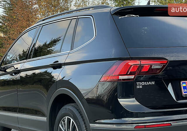 Черный Фольксваген Тигуан, объемом двигателя 2 л и пробегом 170 тыс. км за 18799 $, фото 48 на Automoto.ua
