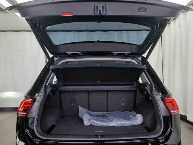 Чорний Фольксваген Тігуан, об'ємом двигуна 2 л та пробігом 51 тис. км за 21000 $, фото 4 на Automoto.ua