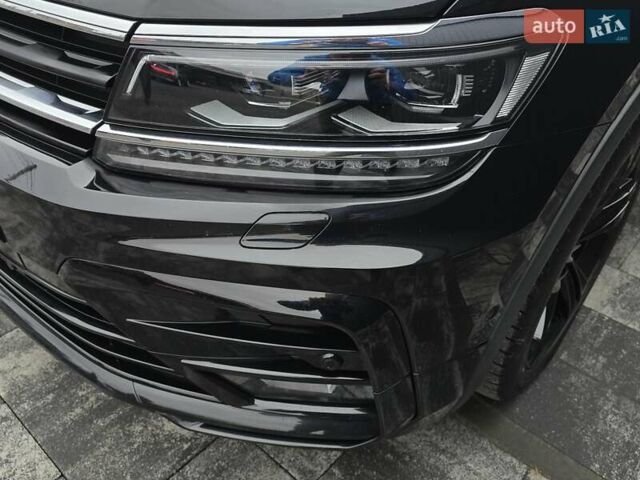 Черный Фольксваген Тигуан, объемом двигателя 2 л и пробегом 199 тыс. км за 31000 $, фото 27 на Automoto.ua