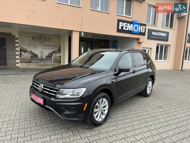 Чорний Фольксваген Тігуан, об'ємом двигуна 2 л та пробігом 232 тис. км за 14200 $, фото 1 на Automoto.ua