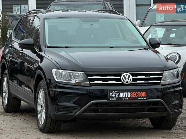 Чорний Фольксваген Тігуан, об'ємом двигуна 2 л та пробігом 129 тис. км за 17500 $, фото 4 на Automoto.ua