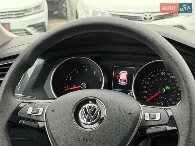 Чорний Фольксваген Тігуан, об'ємом двигуна 2 л та пробігом 129 тис. км за 17500 $, фото 28 на Automoto.ua