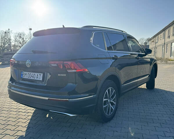 Черный Фольксваген Тигуан, объемом двигателя 2 л и пробегом 160 тыс. км за 21000 $, фото 3 на Automoto.ua
