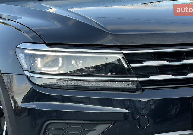 Черный Фольксваген Тигуан, объемом двигателя 2 л и пробегом 170 тыс. км за 18799 $, фото 20 на Automoto.ua