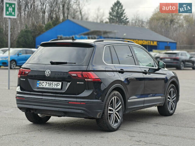 Черный Фольксваген Тигуан, объемом двигателя 1.97 л и пробегом 208 тыс. км за 25300 $, фото 7 на Automoto.ua
