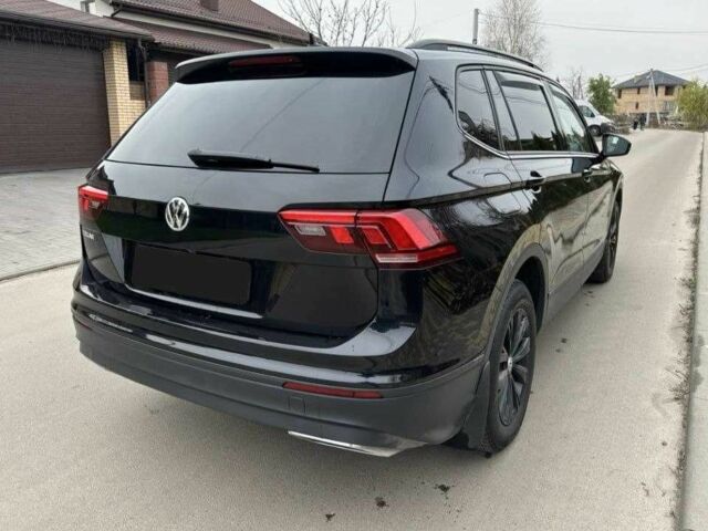 Черный Фольксваген Тигуан, объемом двигателя 2 л и пробегом 184 тыс. км за 18500 $, фото 7 на Automoto.ua