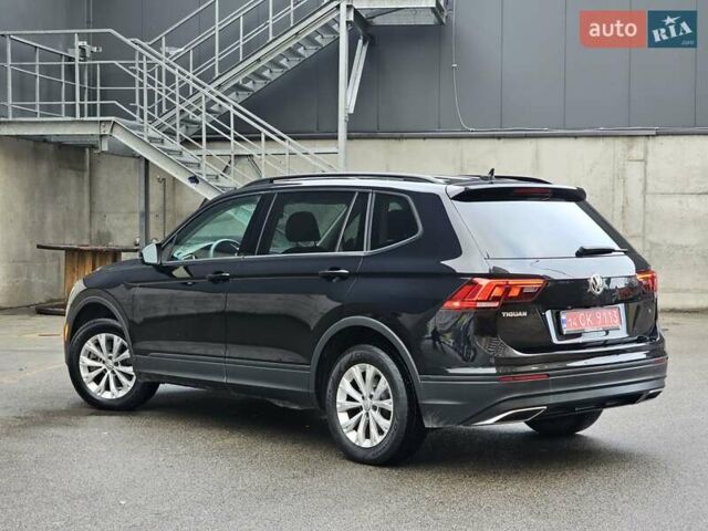 Черный Фольксваген Тигуан, объемом двигателя 2 л и пробегом 106 тыс. км за 18999 $, фото 2 на Automoto.ua