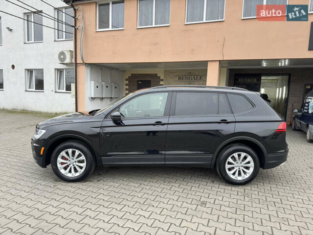 Чорний Фольксваген Тігуан, об'ємом двигуна 2 л та пробігом 232 тис. км за 14200 $, фото 10 на Automoto.ua