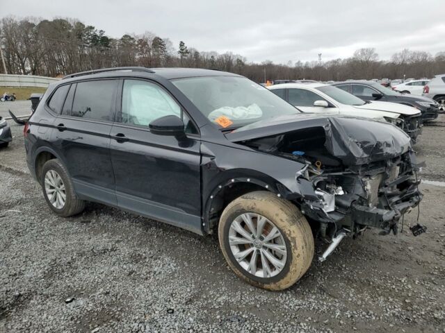 Чорний Фольксваген Тігуан, об'ємом двигуна 2 л та пробігом 112 тис. км за 8300 $, фото 2 на Automoto.ua