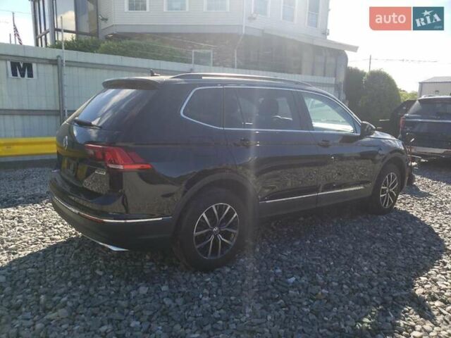 Черный Фольксваген Тигуан, объемом двигателя 2 л и пробегом 65 тыс. км за 3000 $, фото 2 на Automoto.ua