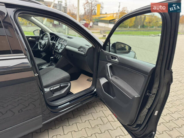 Чорний Фольксваген Тігуан, об'ємом двигуна 2 л та пробігом 232 тис. км за 14200 $, фото 28 на Automoto.ua