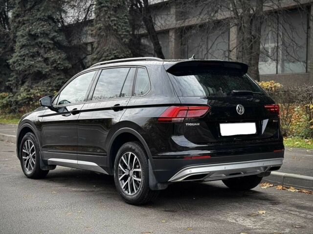 Чорний Фольксваген Тігуан, об'ємом двигуна 2 л та пробігом 134 тис. км за 22000 $, фото 5 на Automoto.ua