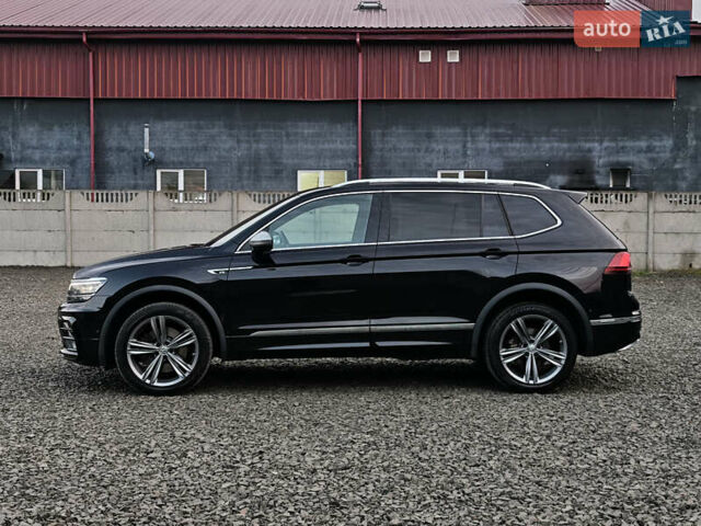 Черный Фольксваген Тигуан, объемом двигателя 2 л и пробегом 177 тыс. км за 32999 $, фото 7 на Automoto.ua