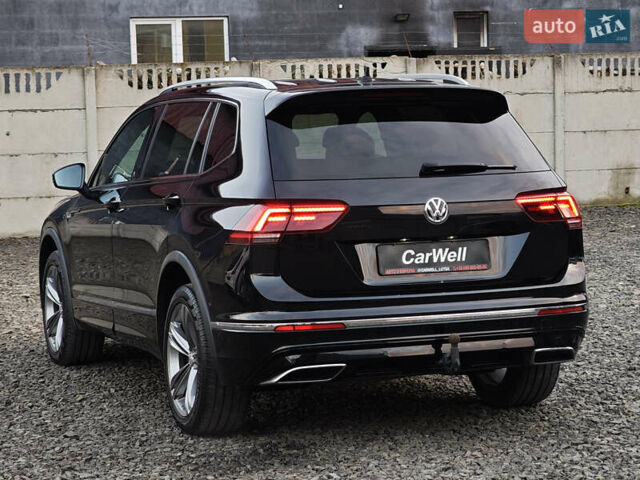 Черный Фольксваген Тигуан, объемом двигателя 2 л и пробегом 177 тыс. км за 32999 $, фото 3 на Automoto.ua
